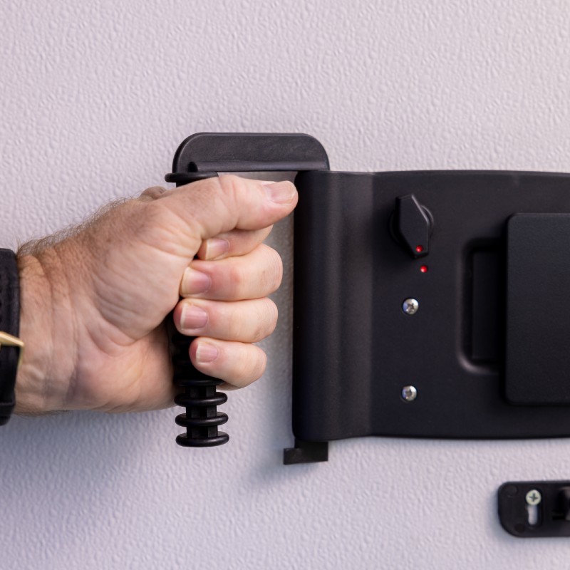 Hand comfortably gripping the RV Hand Pull installed on door